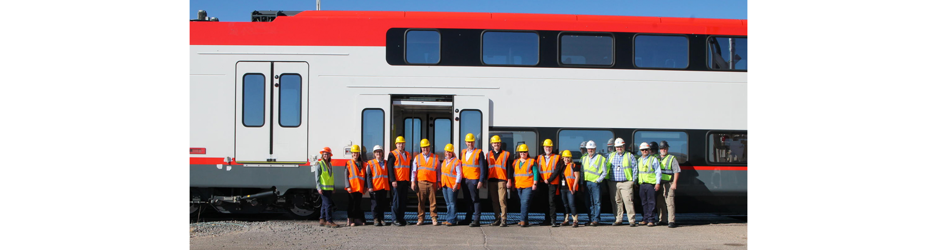 Caltrain Team group photo in front of train