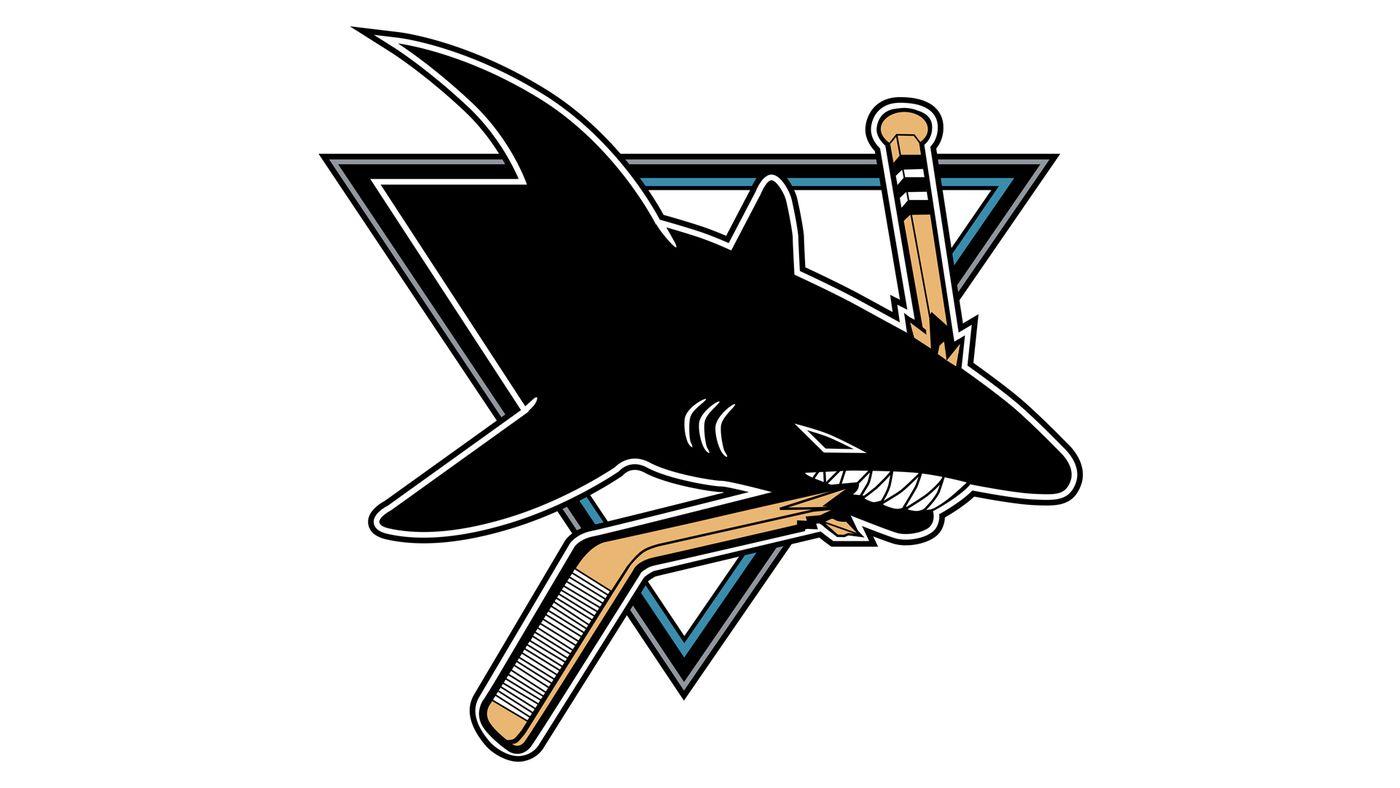San Jose Sharks logo, in which a black shark is eating a hockey stick