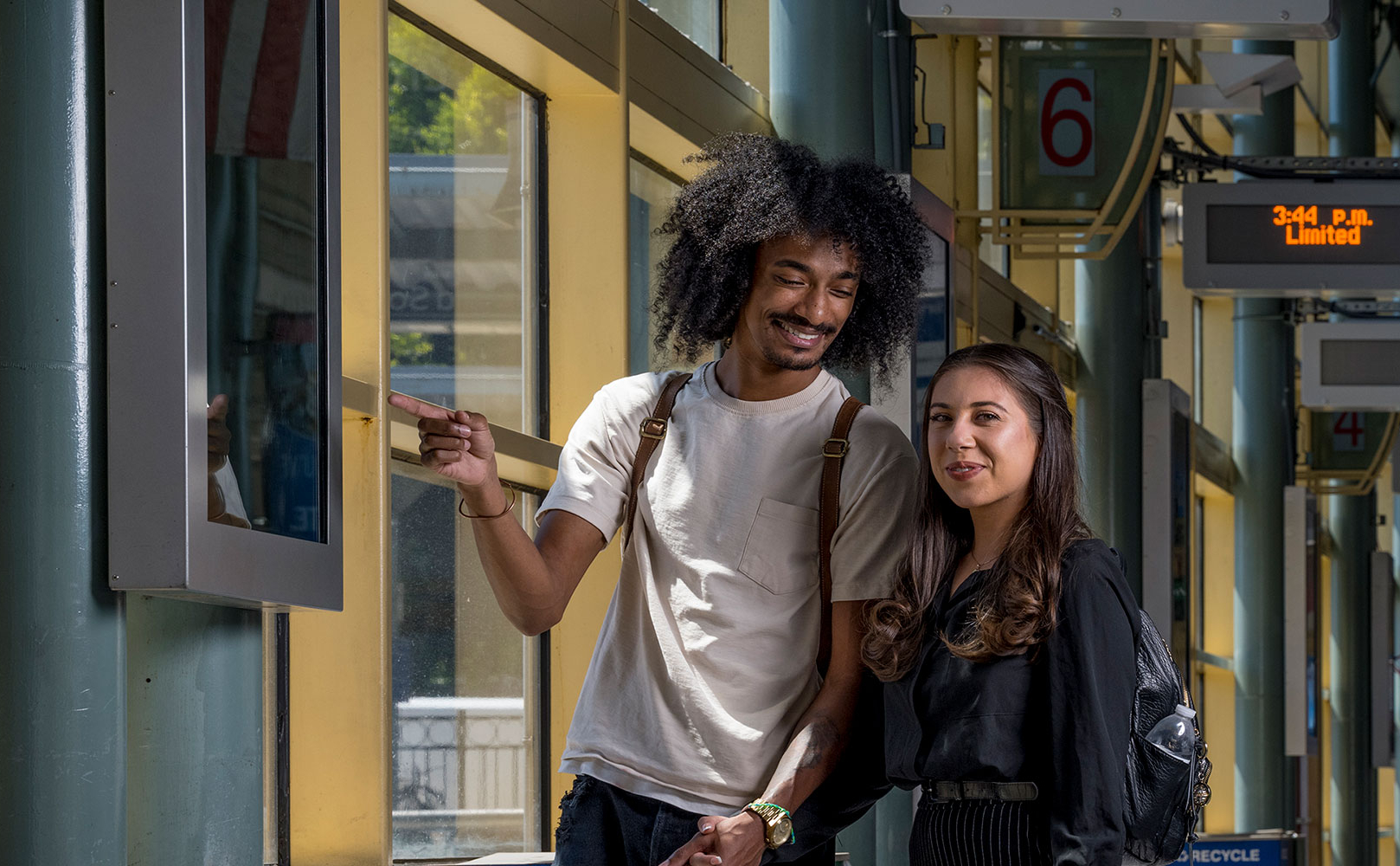 Couple posing at the SF Caltrain Station