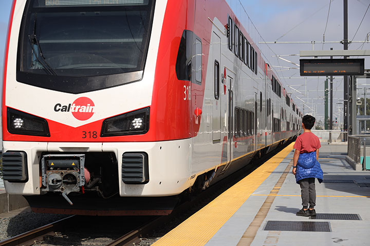 Kid waiting for the Caltrain
