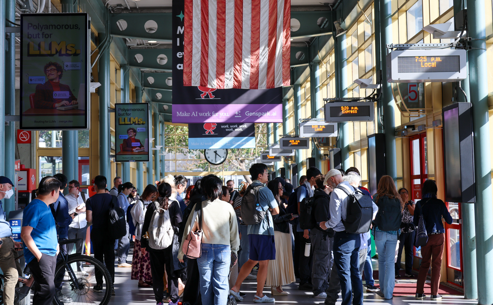 Large crowd of riders boarding Caltrain at San Francisco Station