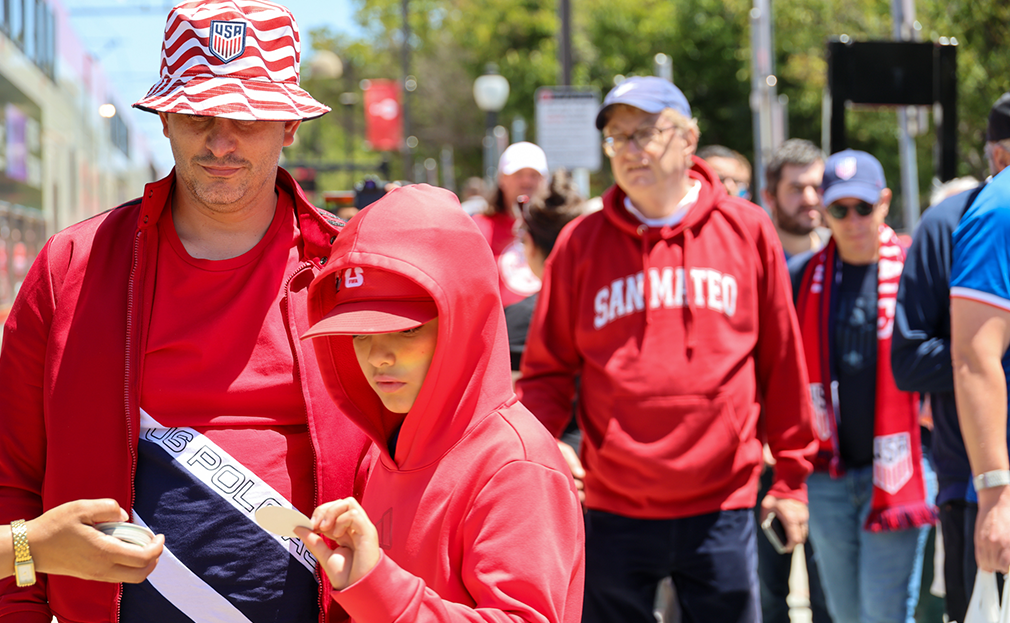 Team USA Fans Collecting Caltrain Stickers