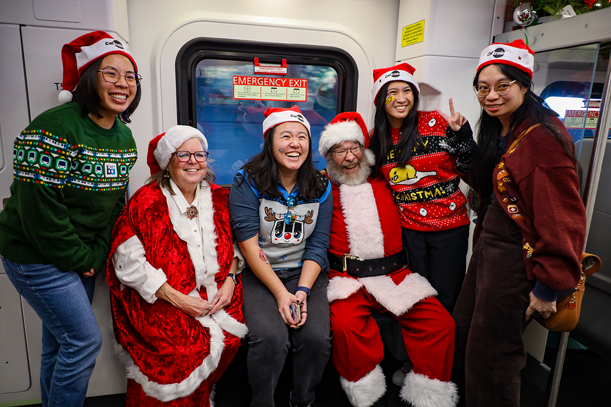 Group posing with Santa