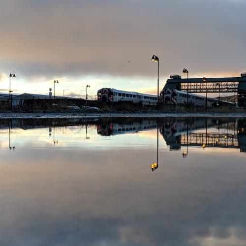 Photograph of the Bayshore Station Pedestrian Overpass and Its Reflection in the Water