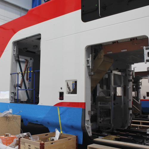 Exterior painting on the first trainset's cab car. June 2018