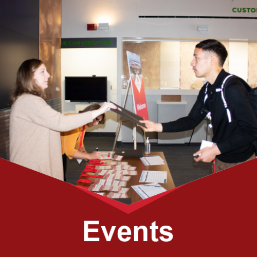 Event with attendee receiving materials