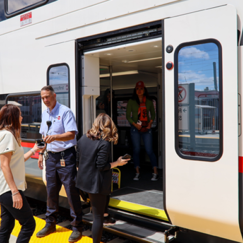Passengers boarding EMU
