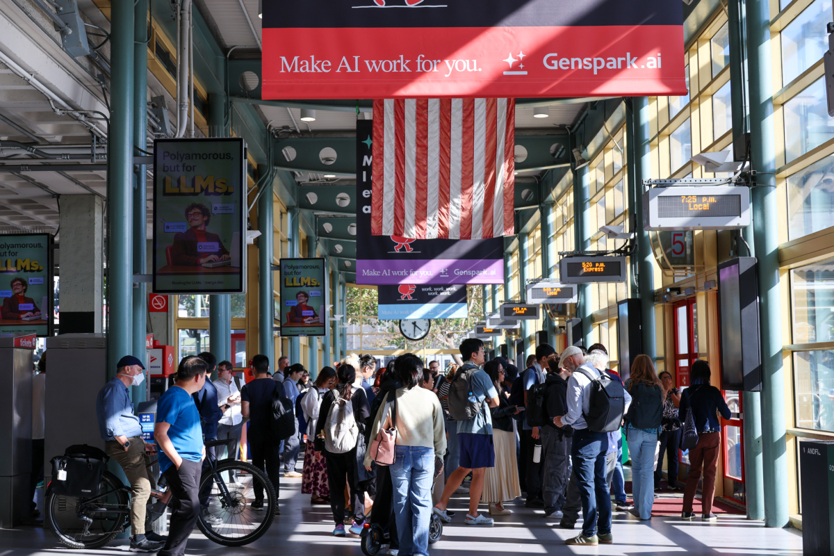 Large crowd of riders boarding Caltrain at San Francisco Station